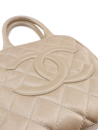 Quilted Tassel Top Handle Bag