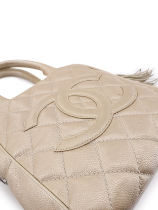 Quilted Tassel Top Handle Bag